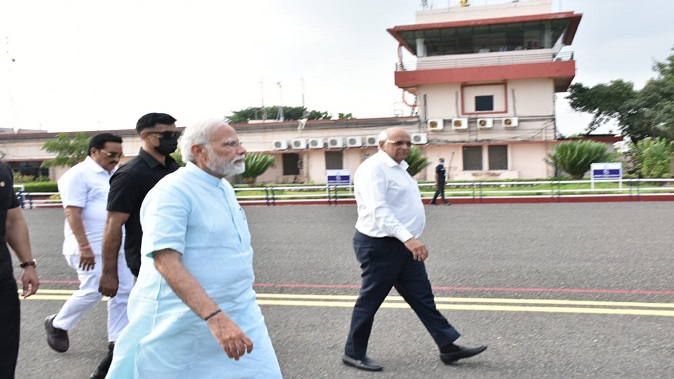 Chief Minister and dignitaries bidding farewell to Prime Minister Narendra Modi at Bhavnagar Airport