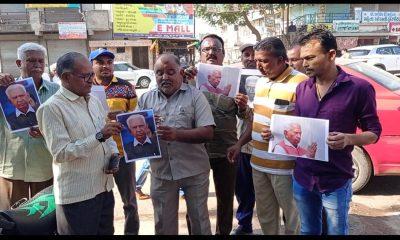 dalit-rights-forum-demands-introduction-of-atrocities-by-burning-posters-of-vajubhai-wala-in-sihore