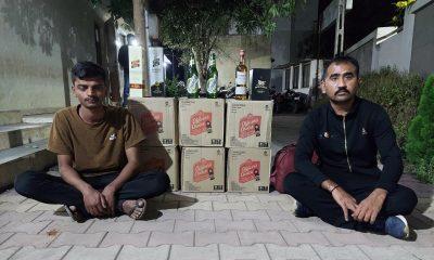 two-persons-were-caught-with-a-car-full-of-foreign-liquor-and-tins-of-beer-near-nari-chowkdi