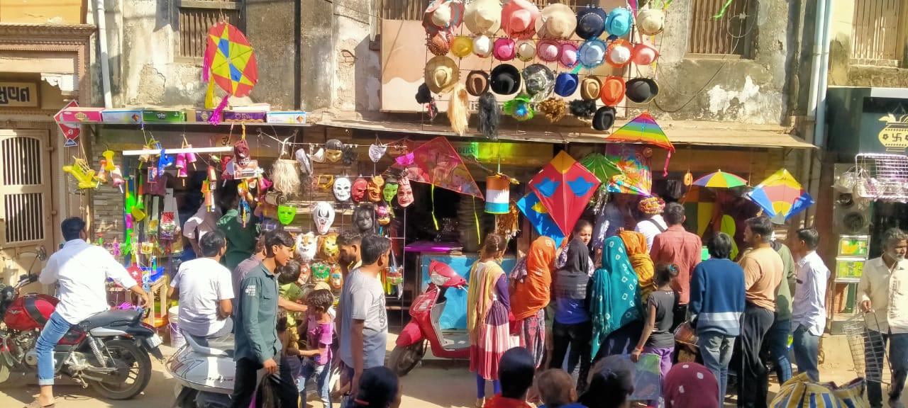 On the eve of Uttarayan in Sihore, customers thronged to buy kite-strings