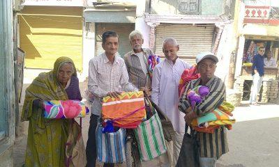 Distribution of blankets by Devubhai Dholakia, a well-known industrialist of Sihore