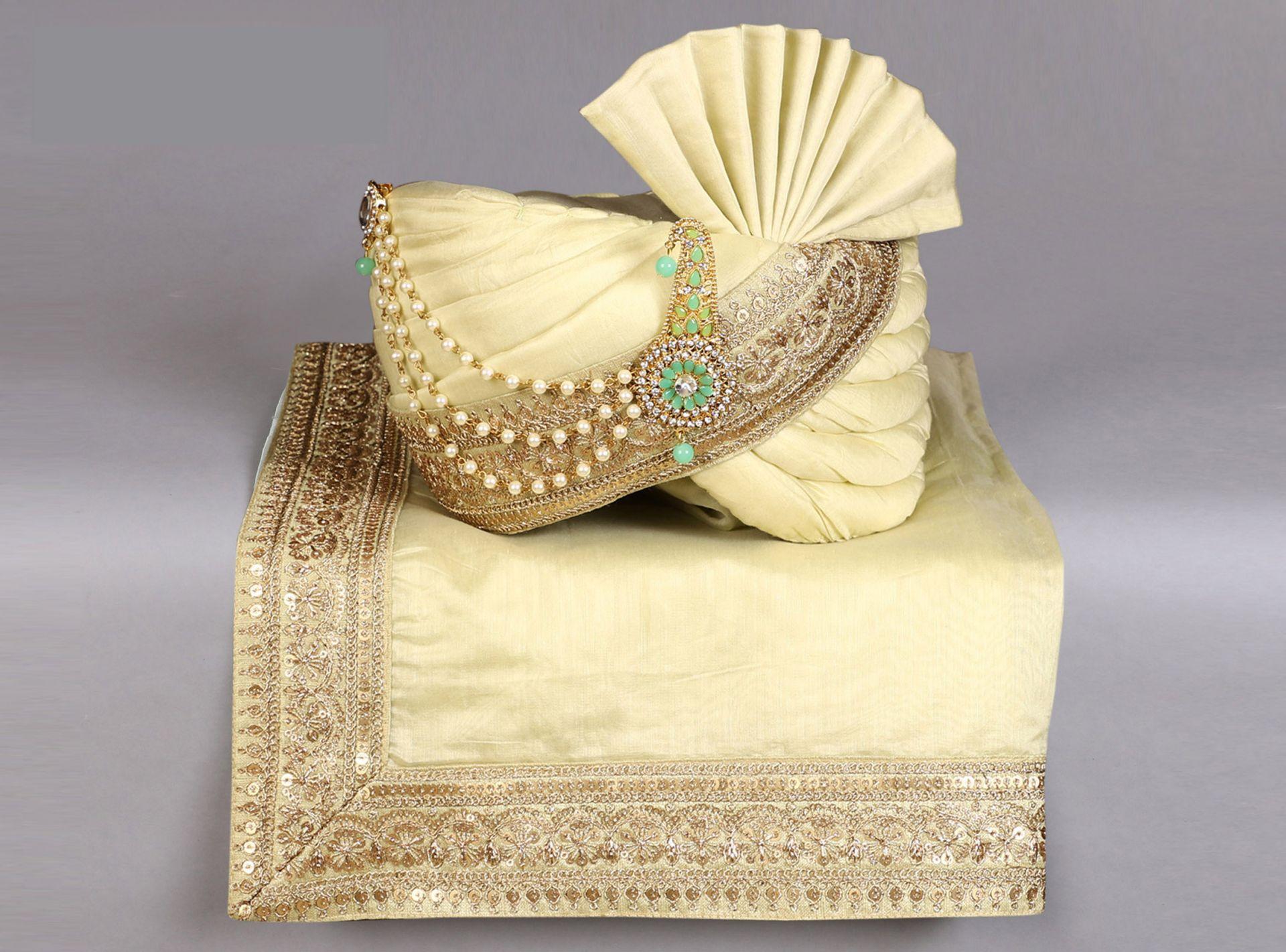 A safa that flourishes in design and style to adorn the head of the groom, groomsmen and host.