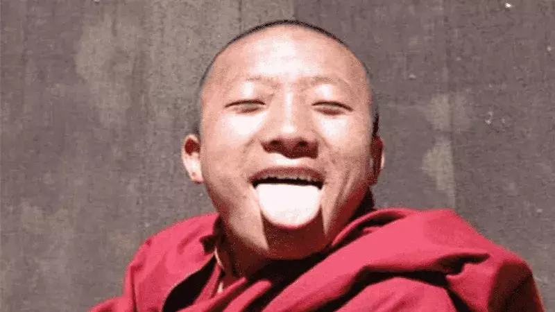  welcome-guest-by-showing-the-tongue-in-tibet