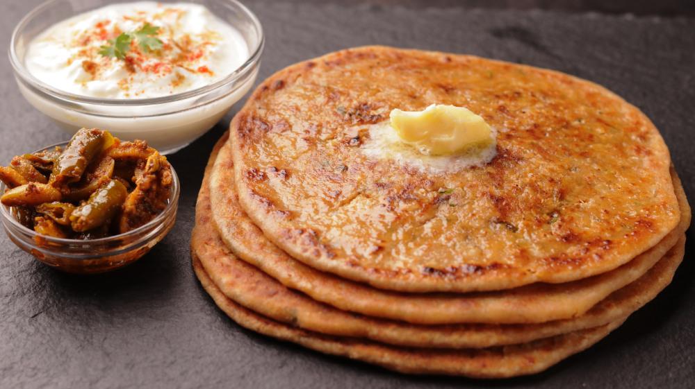 You must have tasted Sesame Ladoo, but have you tried its Paratha? On the day of Makar Sankranti, make sweet parathas made of sesame seeds like this