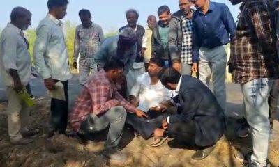 District Development Officer Prashant Jilova, who visited MNREGA scheme works in Sihore taluk, gave first aid to an injured bike rider.