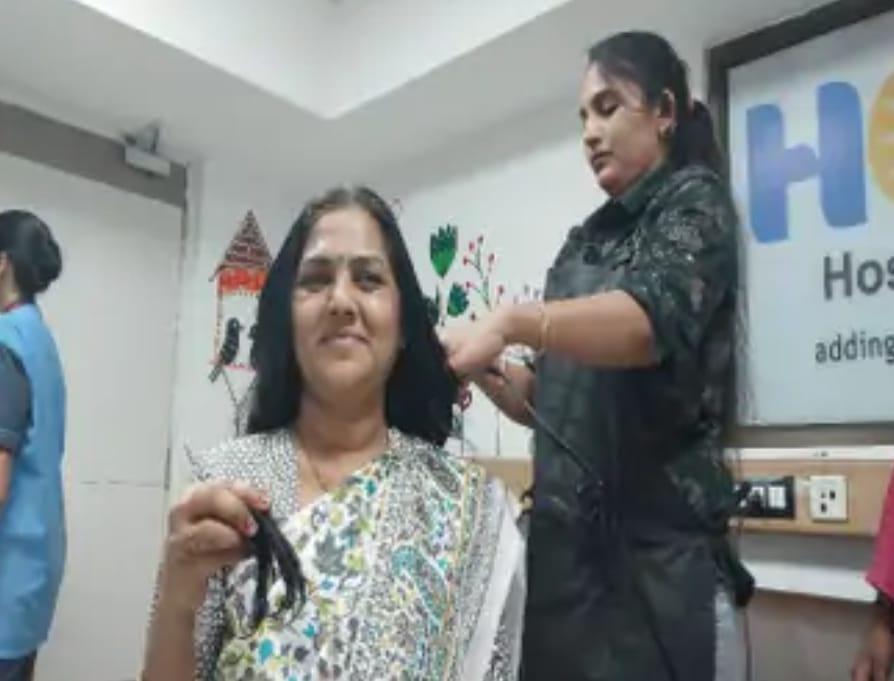 hair-donation-drive-organized-by-hcg-hospital-bhavnagar-on-the-occasion-of-world-cancer-day-first-of-all-the-mayor-donated-hair