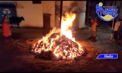 In different areas of Sihore, people burnt Holika even in the midst of rainy and windy weather.