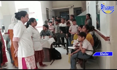 Eyes and numbers of primary school students are checked in Sehore Government Hospital.
