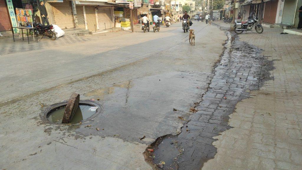 Trahimam with the flowing water of the sewer in the main market of Sehore; Tantra cleanliness campaign limited only on paper