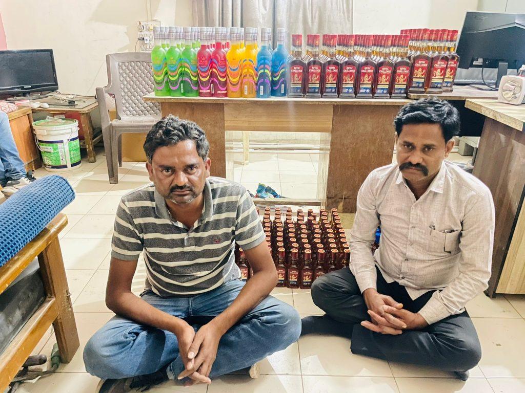 Three persons were caught with a car full of foreign liquor from Varatej's Lakhanka Road