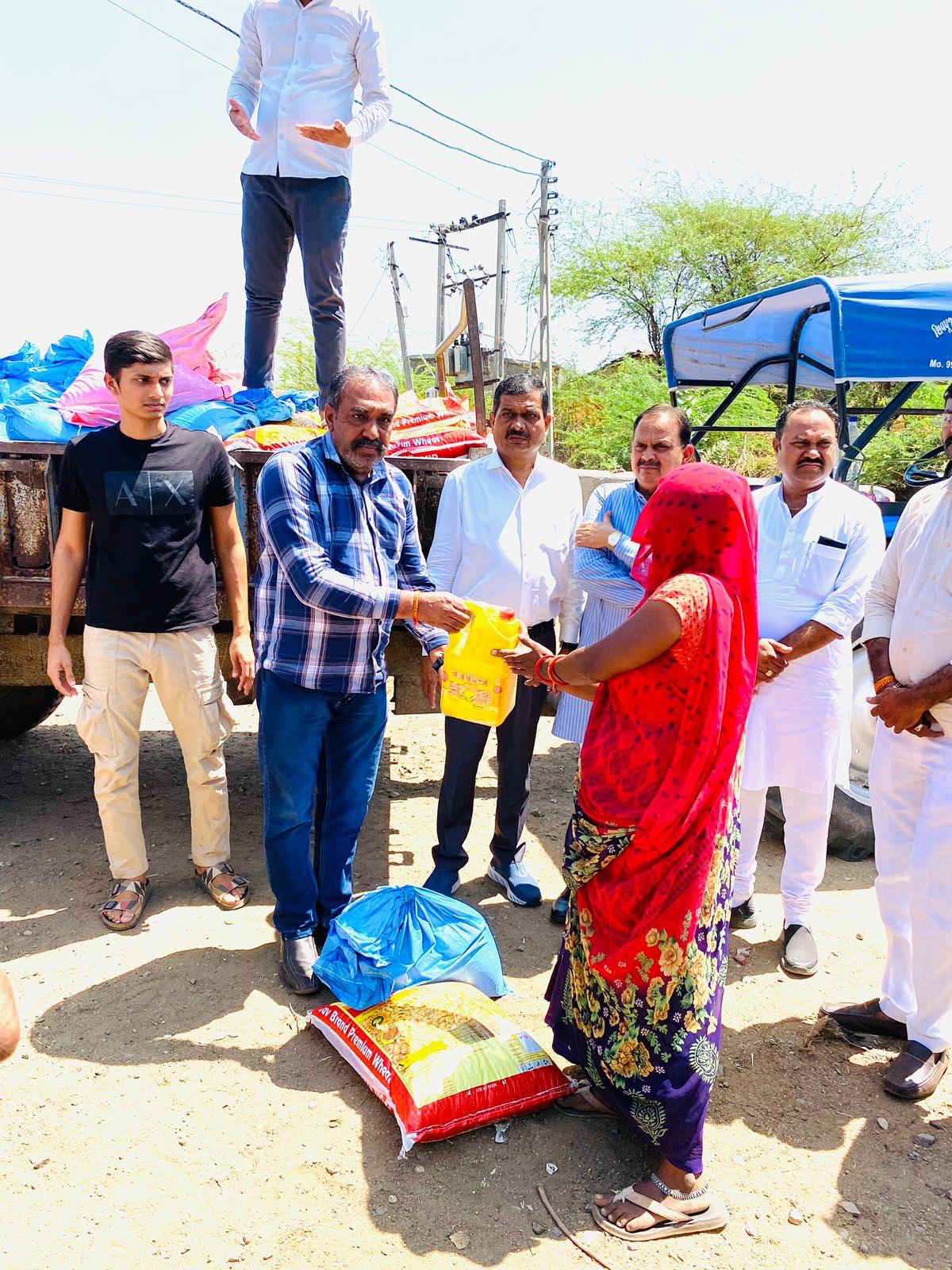 At Garhula village of Sihore, state BJP minister Raghubhai Honbal distributed food grain kits to the needy.