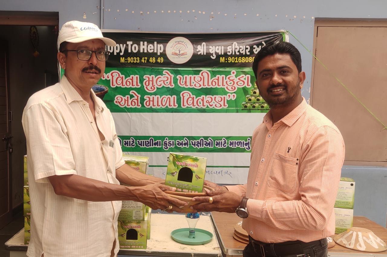 Yuva Career Academy of Bhavnagar distributed water jugs