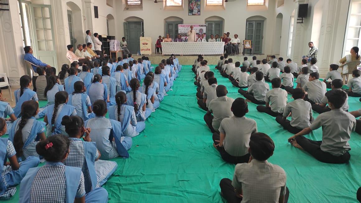 Distribution of books to students at Sehore Education Society with donations from a Mumbai-based donor.