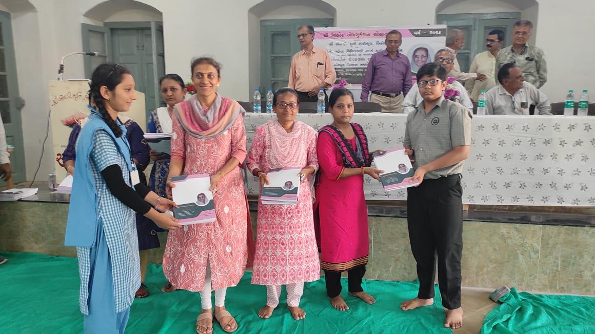 Distribution of books to students at Sehore Education Society with donations from a Mumbai-based donor.