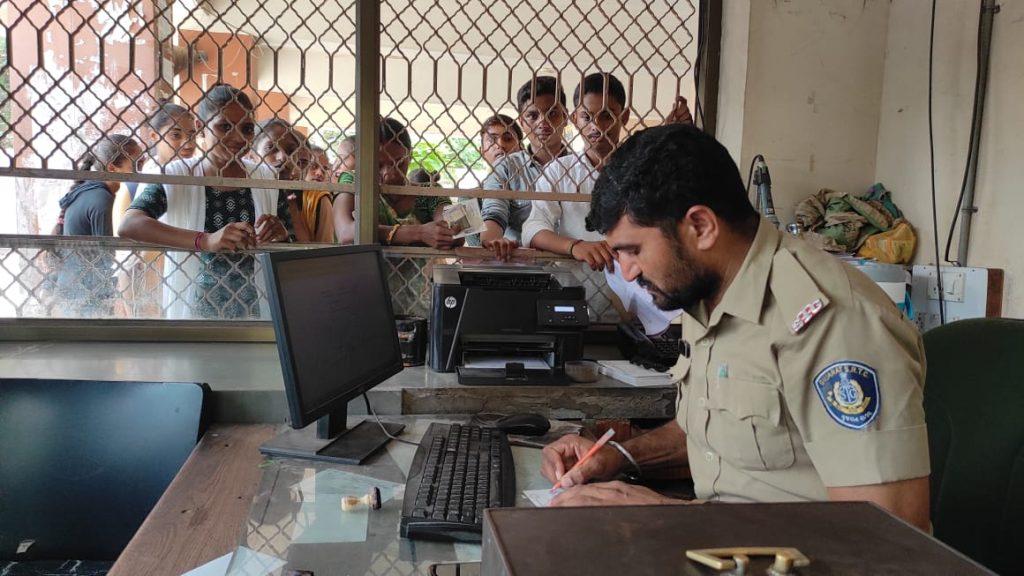 Sihor; Students stand in queue for half a day for bus passes