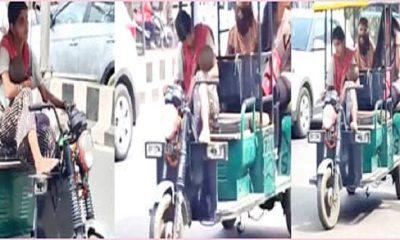 Child in one hand: E-rickshaw handle in other hand: The courage of this mother makes the eyes wet.