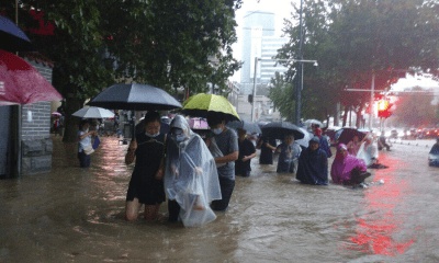 20 dead, metro-rail service suspended due to heavy rains in China's capital Beijing; More than 400 flights were cancelled