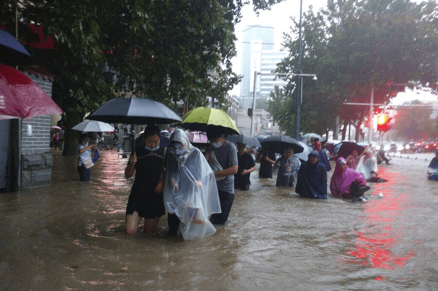 20 dead, metro-rail service suspended due to heavy rains in China's capital Beijing; More than 400 flights were cancelled
