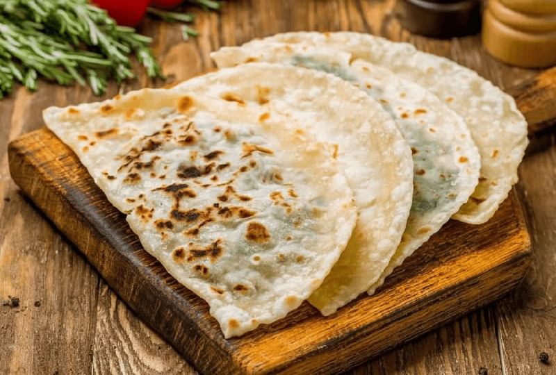 Make desi tadka naan sandwiches for breakfast, a popular easy recipe