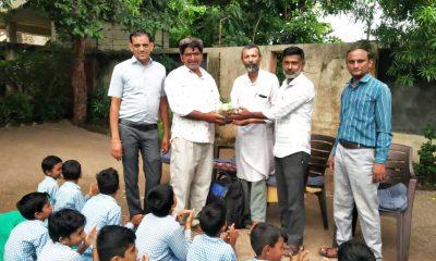 khakhara-seed-distribution-in-school-at-krishnapara-village-of-sihore-taluka